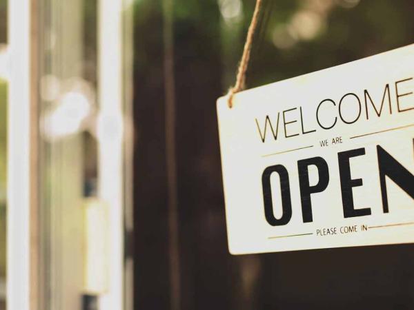 Open for business storefront sign