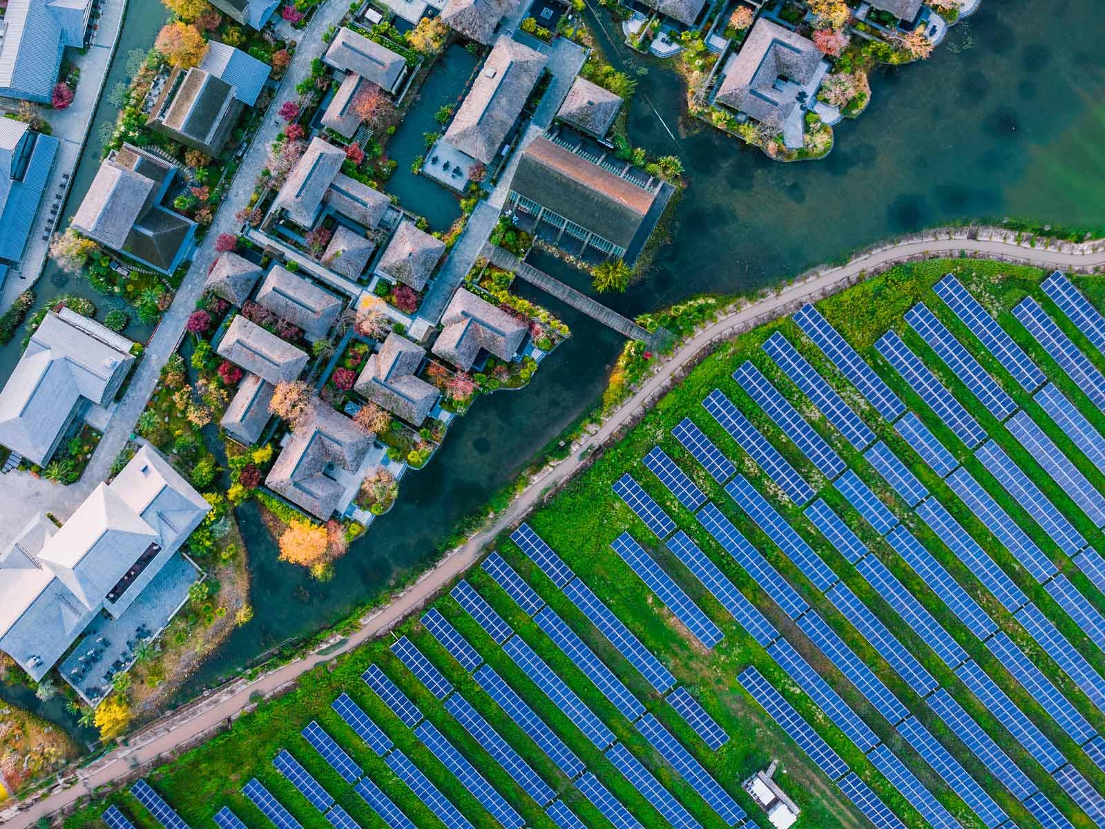 Solar panels next to housing development