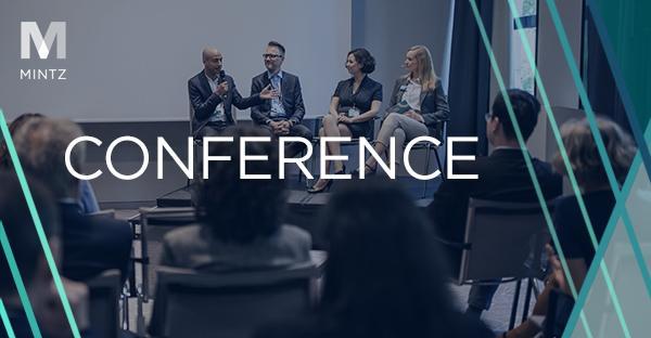 Black‑and‑white city skyline with “Conference” text.